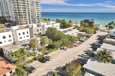 an aerial view of a city with the ocean at Walnut Beach - By Atlantikos in Hollywood