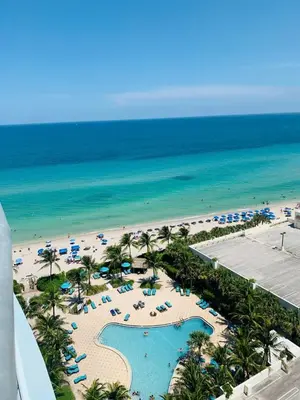 a view of the beach from the balcony of a resort at The Tides on Hollywood Beach in Hollywood