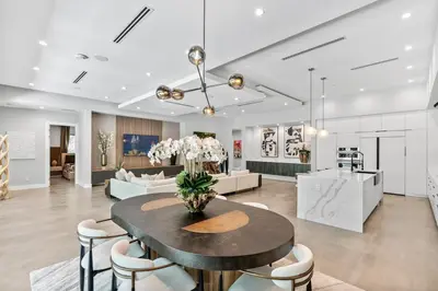 a living room with a table and chairs at New construction Fort Lauderdale luxury villa with Pool in Fort Lauderdale