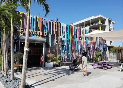 a building with a bunch of surfboards hanging from it at 76 Tropical Retreat in Miami in Miami