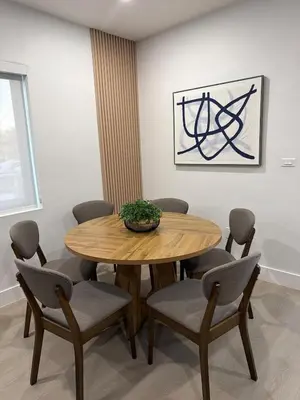 a dining room with a wooden table and chairs at 78 Tropical soak in Miami