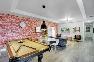 a living room with a ping pong table at 397 A - Beautiful Home in Miami in Miami