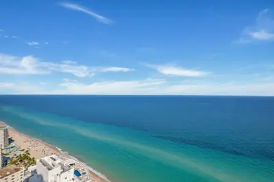 an aerial view of the beach and the ocean at Prime Oceanfront 3BR Mansion in the Sky in Hollywood
