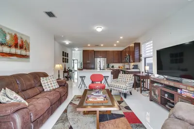 a living room with a couch and a table at Easy Park and University Access! Family Miami Escape in Miami