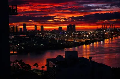 a view of a river with a city at sunset at Miami Bay Million-Dollar View | Private Condo in Miami