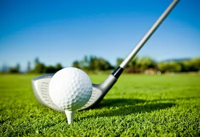 a golf ball and a club on the grass at Holiday Inn Miami West - Airport Area by IHG in Hialeah Gardens