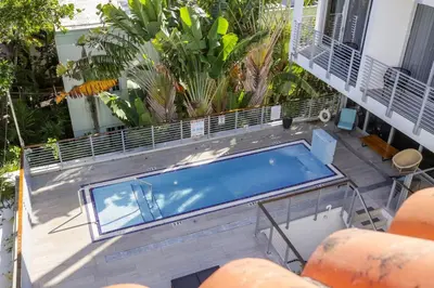 an overhead view of a swimming pool on a building at The Meridian Hotel by At Mine Hospitality in Miami Beach