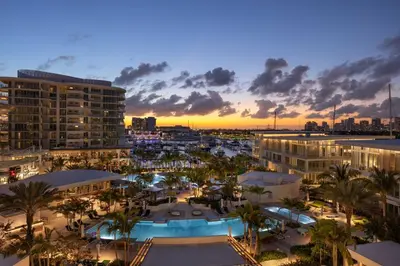 a view of a city with a marina at sunset at Pier Sixty-Six in Fort Lauderdale