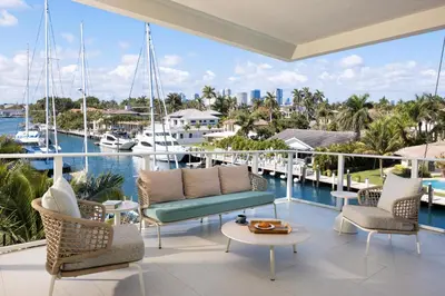 a balcony with a view of the water and boats at Pier Sixty-Six in Fort Lauderdale