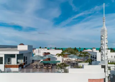 a rendering of the exterior of a hotel with a church at Dream South Beach, by Hyatt in Miami Beach