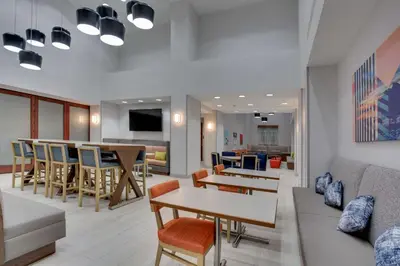 a living room with a couch and a table at Hampton Inn & Suites Fort Lauderdale - Miramar in Miramar