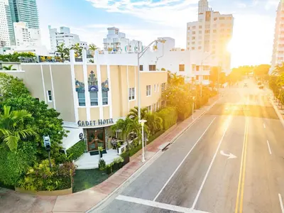 an empty street in a city with buildings at Cadet Hotel in Miami Beach