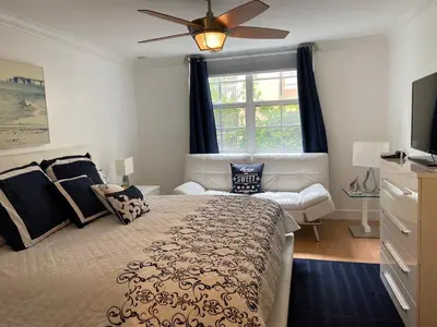 a bedroom with a bed and a ceiling fan at The Nautical! Amazing 3Bed 2Bath Apartment at Aventura Yacht Club in Aventura