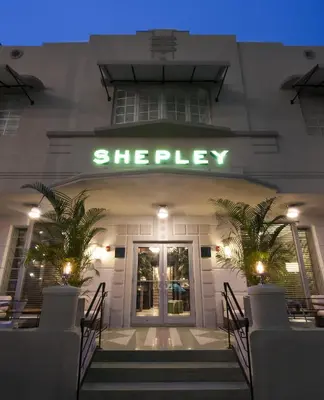 a building with a sign that reads therapy at Shepley South Beach Hotel in Miami Beach