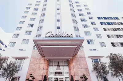 a view of the exterior of a building at Cadillac Hotel & Beach Club, Autograph Collection in Miami Beach