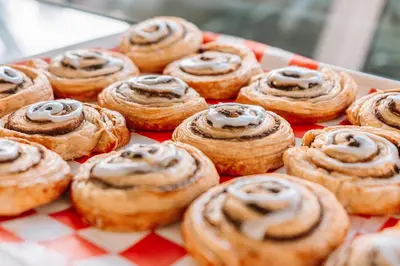 a bunch of pastries sitting on a table at Nuvo Suites Hotel - Miami Doral in Miami