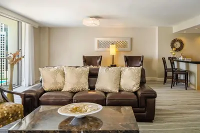 a living room with a couch and a table at Hyatt Regency Miami in Miami