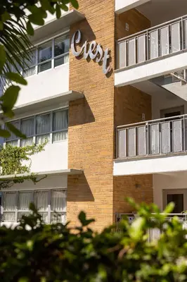 a brick building with the word expect written on it at Crest Hotel Suites in Miami Beach