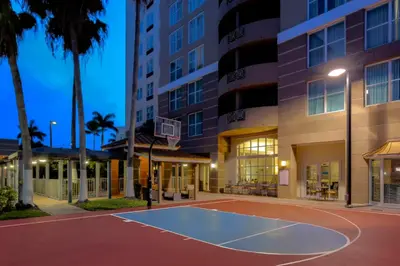a basketball court in front of a building at Staybridge Suites Miami Doral Area by IHG in Miami