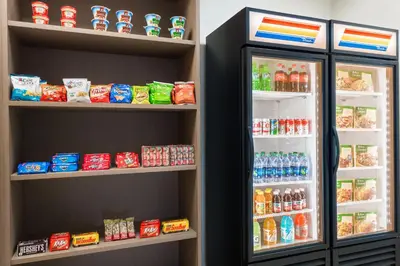 a refrigerator filled with lots of food and drinks at Holiday Inn Express Hotel & Suites Ft. Lauderdale-Plantation by IHG in Plantation