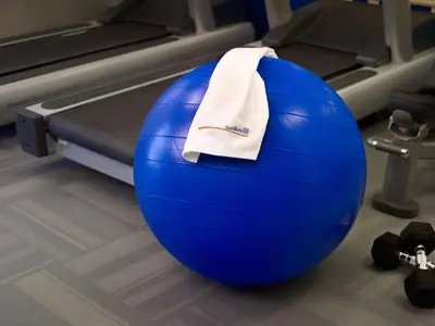 a blue gym ball with a towel on it at Sonesta ES Suites Fort Lauderdale Plantation in Plantation
