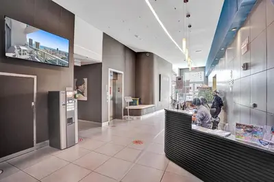 a store aisle with a counter in a store at Modern Penthouse condo with 2 Large private terraces in Hollywood