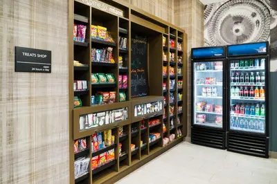 a supermarket aisle with a large amount of products at Hampton Inn & Suites Miami Wynwood Design District, FL in Miami