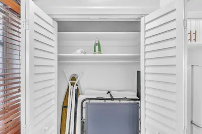 a walk in closet with a suitcase in it at The Sunrise in Hollywood