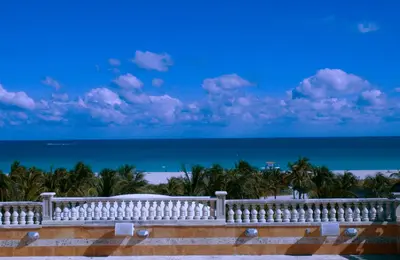a balcony with a view of the beach at The Fritz Hotel in Miami Beach