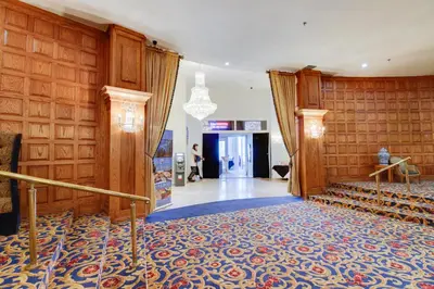 a large room with a staircase and a stair case at Castle Beach: Rumba Suite in Miami Beach