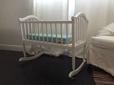 a crib in the corner of a bedroom at On The Beach - Lux 2 Bedroom Miami in Hollywood