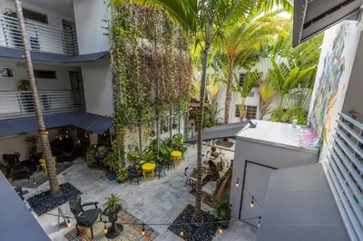 an overhead view of a courtyard with palm trees at Riviera Suites in Miami Beach