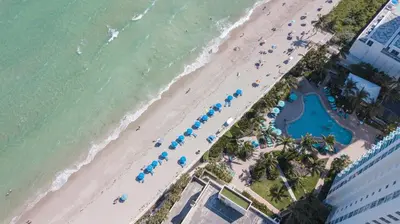 an overhead view of a beach with umbrellas and the ocean at THE TIDES 2bedrooms apt 14th floor WE ARE ON THE BEACH! in Hollywood