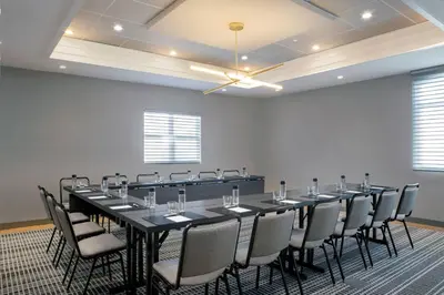 a conference room with a long table and chairs at Residence Inn by Marriott Miami Aventura Mall in Aventura