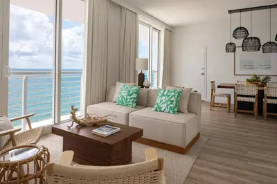 a living room with a couch and a table at The Westin Fort Lauderdale Beach Resort in Fort Lauderdale