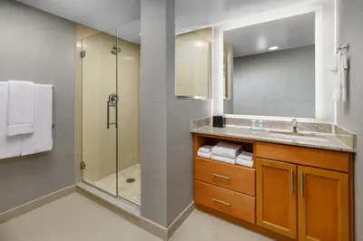 a bathroom with a sink and a shower at Hyatt House Fort Lauderdale Airport/Cruise Port in Dania Beach