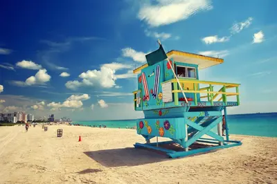 a lifeguard tower sitting on the beach at Park Royal Miami Beach in Miami Beach