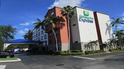 a rendering of the exterior of a hotel at Holiday Inn Express and Suites Fort Lauderdale Airport West by IHG in Davie
