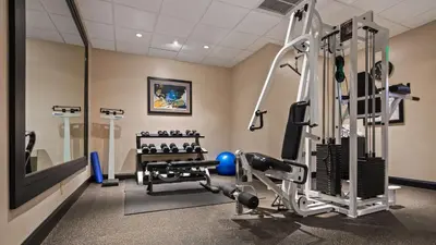 a gym with a treadmill and a weight room at Best Western Plus Hollywood/Aventura in Hollywood