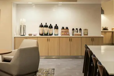 a room with bottles of wine on a counter at Fairfield Inn & Suites by Marriott Miami Airport South in Miami
