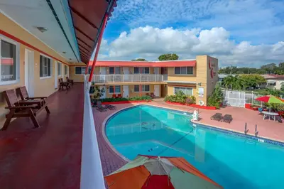 a view from the balcony of a hotel with a swimming pool at Beach and Town Motel in Hollywood