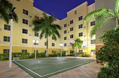 a basketball court in front of a building at Homewood Suites by Hilton Miami - Airport West in Miami