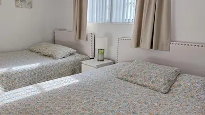 a bedroom with two beds and a window at THE TIDES 1 bedroom apt 8th floor WE ARE ON THE BEACH in Hollywood