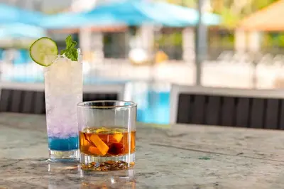 a drink in a glass sitting on a table at Marriott's Villas At Doral in Miami
