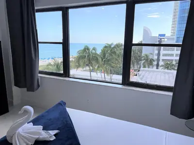 a swan in a room with a view of the ocean at Ocean Front Units at Miami Beach in Miami Beach