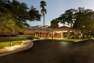 a house with a driveway in front of it at Courtyard by Marriott Fort Lauderdale City of Plantation in Plantation