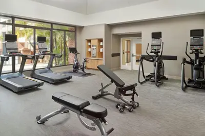 a gym with several exercise bikes in a room at Courtyard by Marriott Fort Lauderdale City of Plantation in Plantation