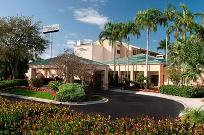 a rendering of the front of a hotel at Sonesta Select Miami Lakes in Miami Lakes