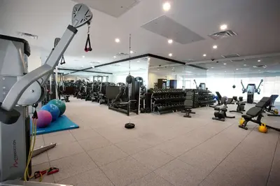 a gym with a lot of equipment in a room at Miami Marriott Dadeland in Miami