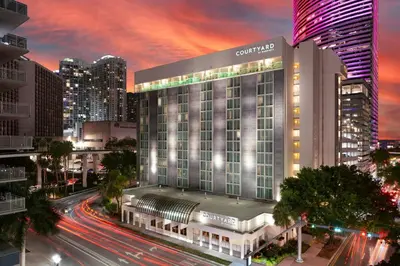 a rendering of a building in a city at night at Courtyard Miami Downtown Brickell Area in Miami